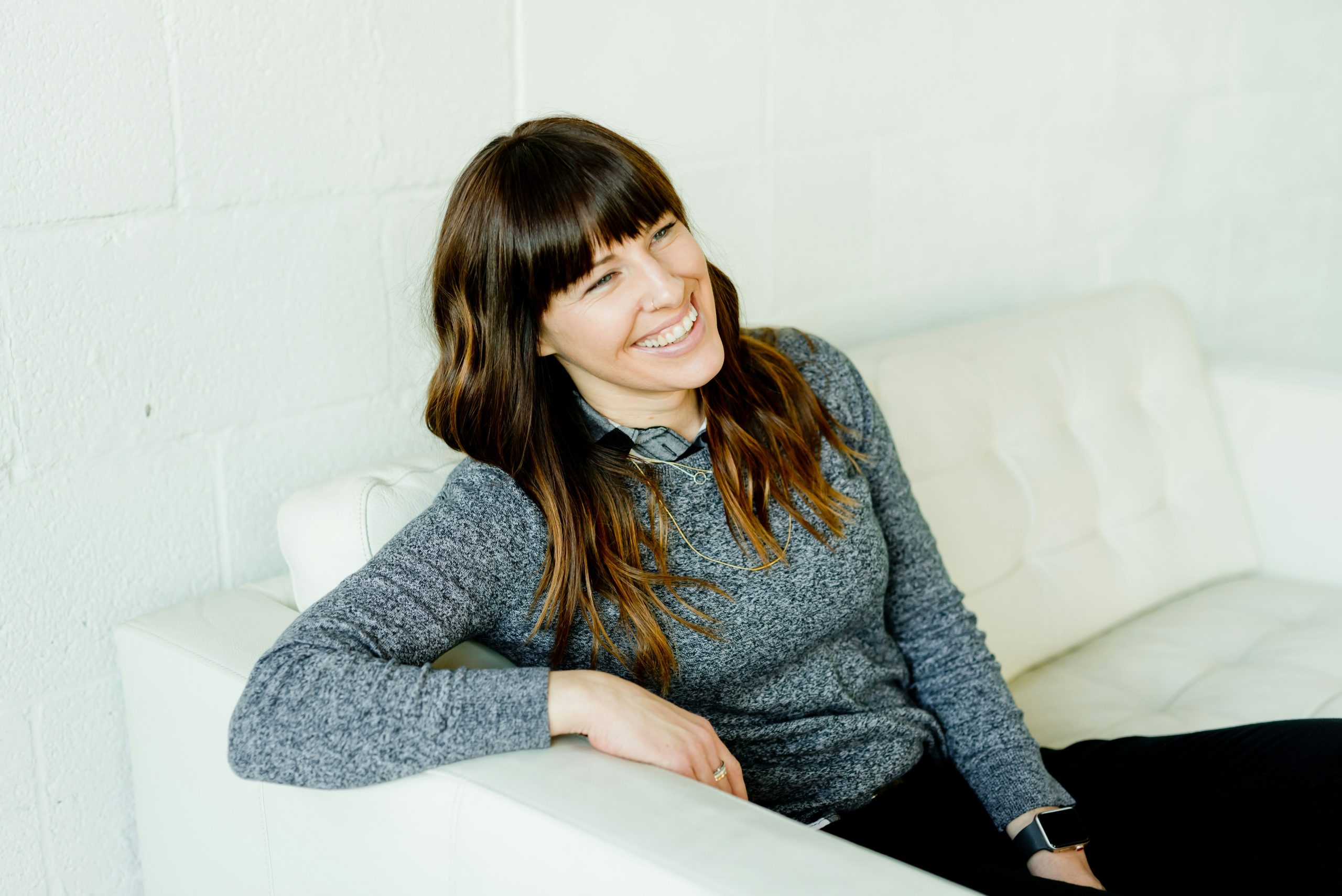 Woman in Minneapolis smiling during her CBT session