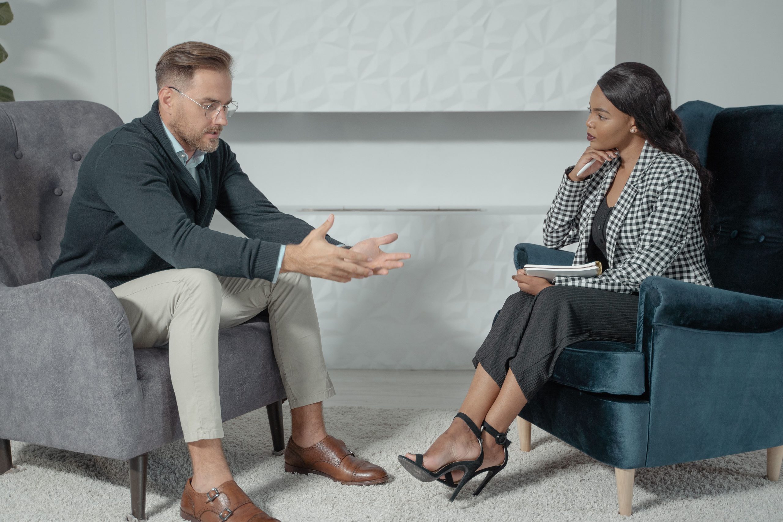 Man discussing his communication challenges with his therapist