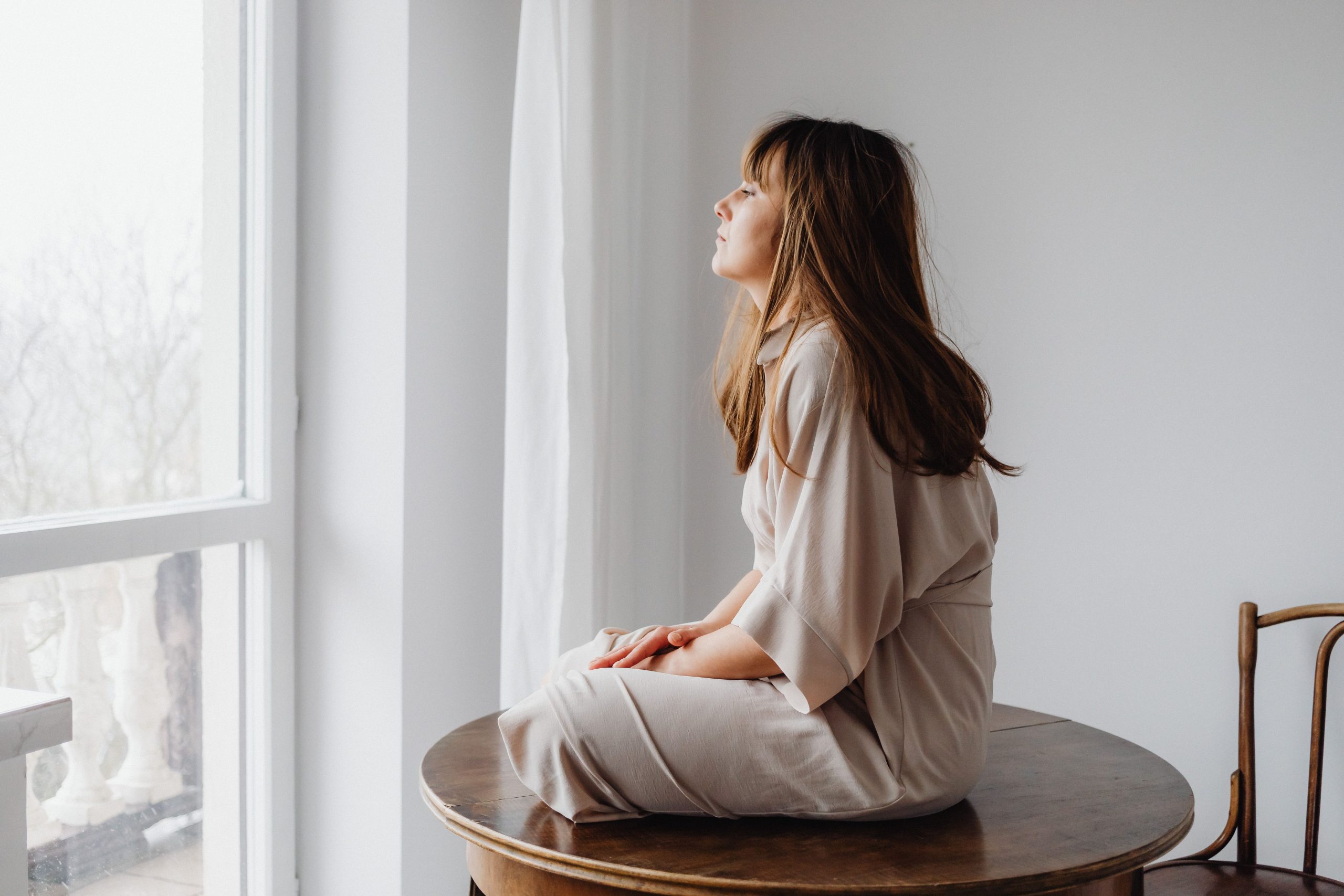 Woman Waking Up Calm and Happy - DBT Skills In Edina MN